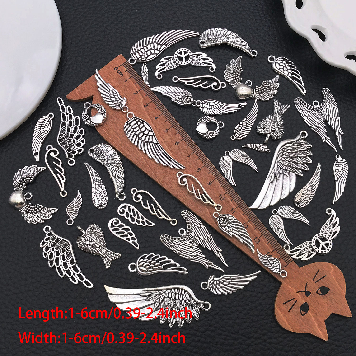 Angel Wing Charms, New 22/42 P - огляд і ціна Vintage Fashion Stores
